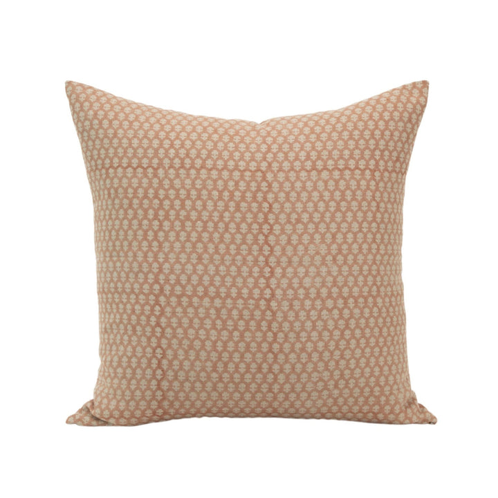 Small floral patterned pillow on a white background
